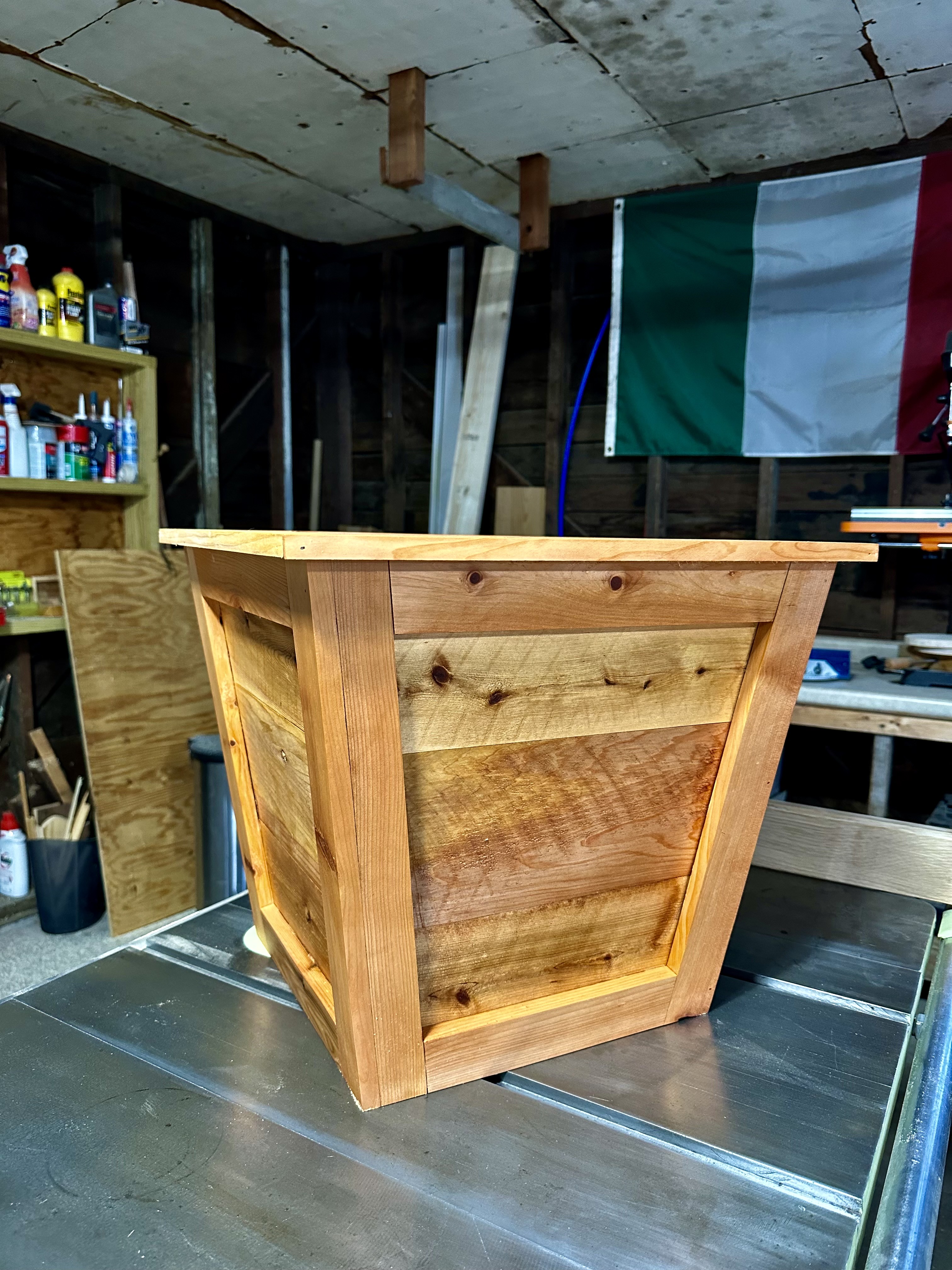 Finished cedar planter from side angle in workshop